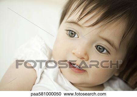 Stock Image - Baby girl, portrait. Fotosearch