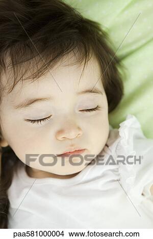 Picture - Baby girl sleeping, portrait. Fotosearch