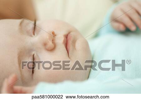 Stock Image - Baby sleeping, close-up. Fotosearch