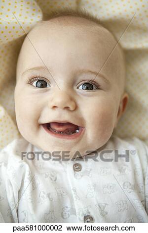 Baby smiling, portrait View Large Photo Image Stock Image - Baby smiling, portrait. Fotosearch