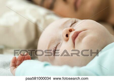 Infant napping View Large Photo Image Picture - Infant napping. Fotosearch