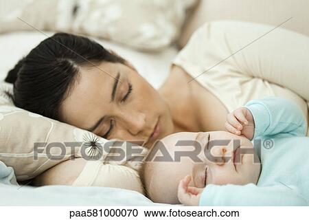 Mother and baby napping together View Large Photo Image Stock Image - Mother and baby napping together. Fotosearch