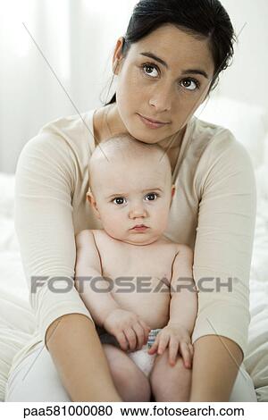 Mother and baby, portrait View Large Photo Image Stock Image - Mother and baby, portrait. Fotosearch