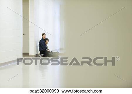 High school friends hanging out in school corridor View Large Photo Image Stock Image - High school friends hanging out in school corridor. Fotosearch