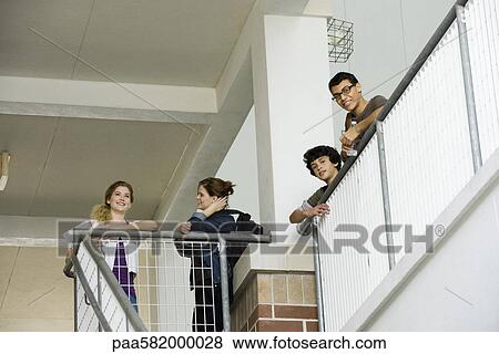 High school students hanging out between classes View Large Photo Image Stock Photo - High school students hanging out between classes. Fotosearch