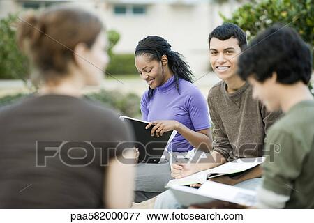 Students studying outdoors View Large Photo Image Stock Photo - Students studying outdoors. Fotosearch