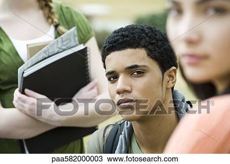 Stock Image - Teenage boy, portrait. Fotosearch