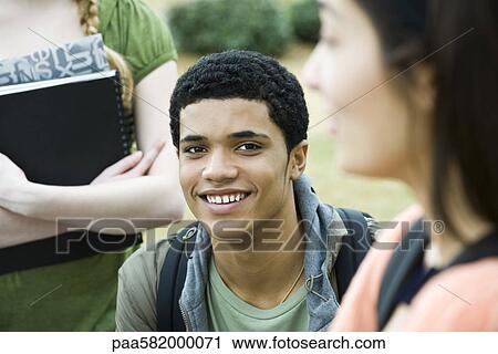 Stock Image - Teenage boy, portrait. Fotosearch