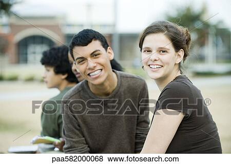 Young friends together, portrait View Large Photo Image Stock Photo - Young friends together, portrait. Fotosearch