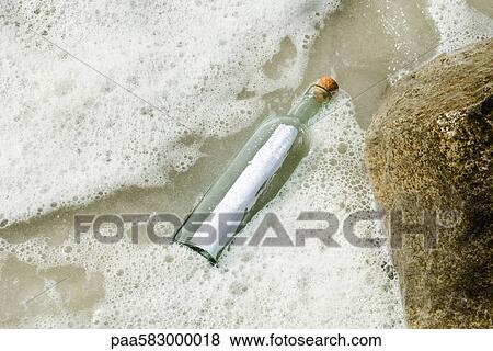 Message in a bottle View Large Photo Image Stock Photo - Message in a bottle. Fotosearch
