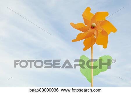 Pinwheel shaped like a flower View Large Photo Image Stock Photograph - Pinwheel shaped like a flower. Fotosearch
