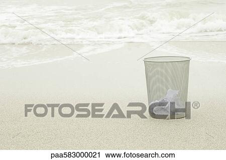 Wastepaper basket on beach View Large Photo Image Stock Image - Wastepaper basket on beach. Fotosearch