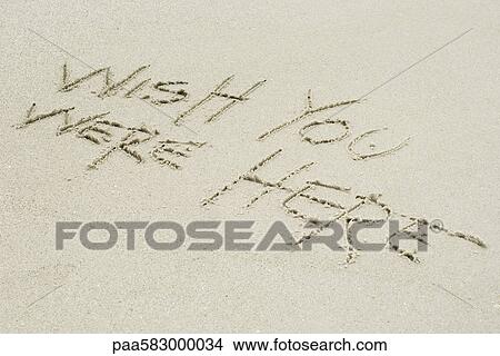 Wish you were here written in sand View Large Photo Image Picture - Wish you were here written in sand. Fotosearch