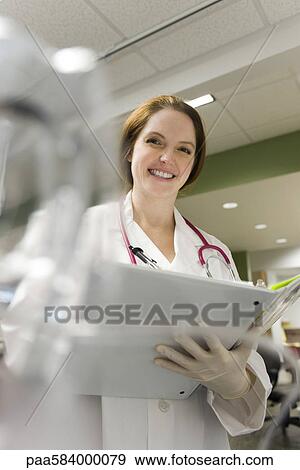 Female doctor, portrait View Large Photo Image Stock Photo - Female doctor, portrait. Fotosearch