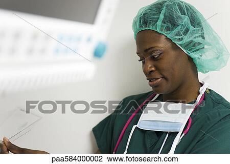 Healthcare worker at work View Large Photo Image Stock Image - Healthcare worker at work. Fotosearch