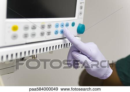 Medical treatment has been advanced through the use of sophisticated computer technology View Large Photo Image Stock Photo - Medical treatment has been advanced through the use of sophisticated computer technology. Fotosearch