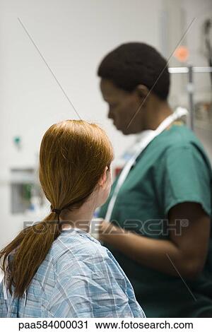 Patient preparing for medical exam View Large Photo Image Stock Image - Patient preparing for medical exam. Fotosearch