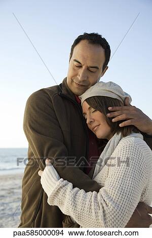 Mature couple embracing outdoors View Large Photo Image Picture - Mature couple embracing outdoors. Fotosearch