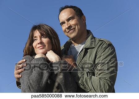 Mature couple together outdoors, portrait View Large Photo Image Stock Photo - Mature couple together outdoors, portrait. Fotosearch