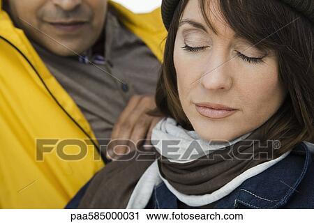 Woman relaxing with husband, close-up View Large Photo Image Stock Image - Woman relaxing with husband, close-up. Fotosearch