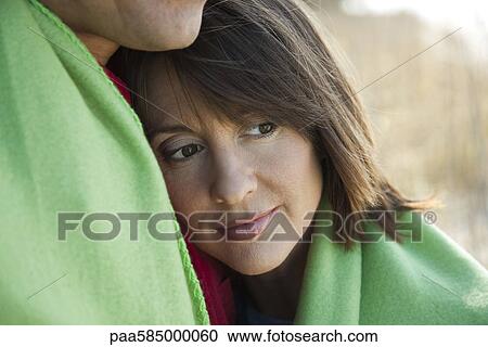 Woman resting head on husband's chest, portrait View Large Photo Image Stock Image - Woman resting head on husband's chest, portrait. Fotosearch