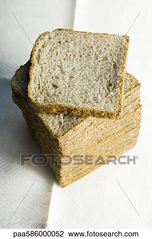 Stock Image - Sliced whole wheat bread. Fotosearch