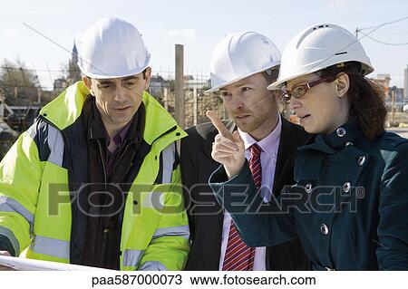 Building contractor and business people in discussion View Large Photo Image Stock Image - Building contractor and business people in discussion. Fotosearch