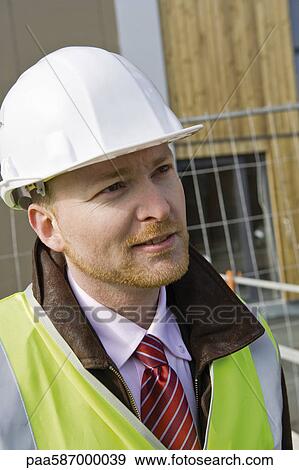 Stock Photo - Building contractor, portrait. Fotosearch