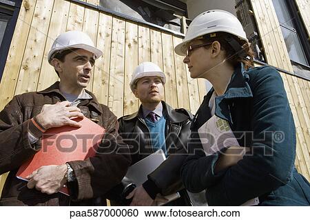 Building contractor talking to business people View Large Photo Image Stock Image - Building contractor talking to business people. Fotosearch