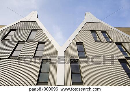 Modern apartment buildings, low angle view View Large Photo Image Stock Photograph - Modern apartment buildings, low angle view. Fotosearch