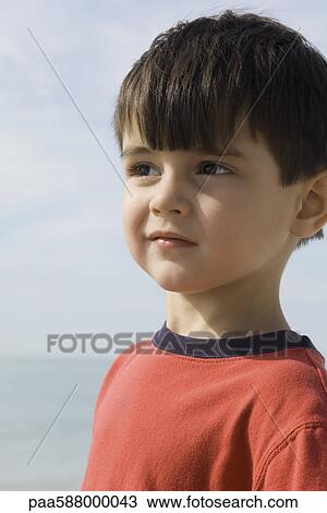 Little boy outdoors, portrait View Large Photo Image Stock Image - Little boy outdoors, portrait. Fotosearch