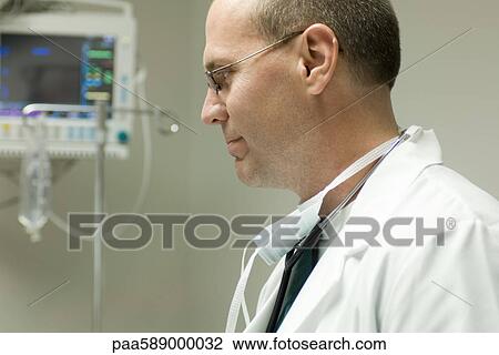 Doctor in hospital room View Large Photo Image Stock Image - Doctor in hospital room. Fotosearch