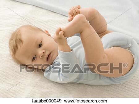 Stock Photo - baby, toddler, infant, foot, feet, flexible, limber. Fotosearch