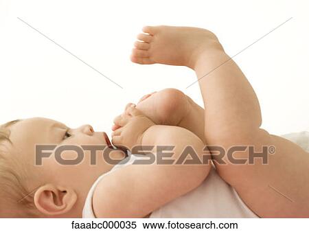 Stock Photography - baby, toddler, infant, foot, feet, mouth, mouths. Fotosearch