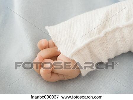 Stock Photo - baby, toddler, infant, hand, part of, cropped, only one baby. Fotosearch