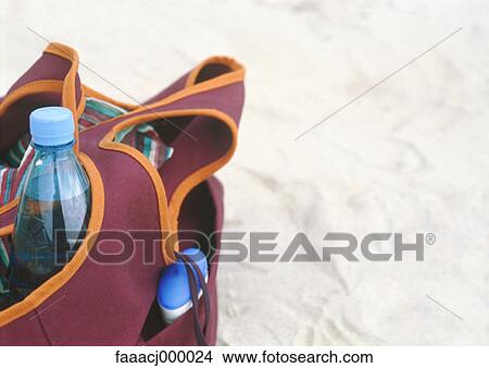 Picture - bag, bags, beach, sand, bottle, bottles, beach bag. Fotosearch