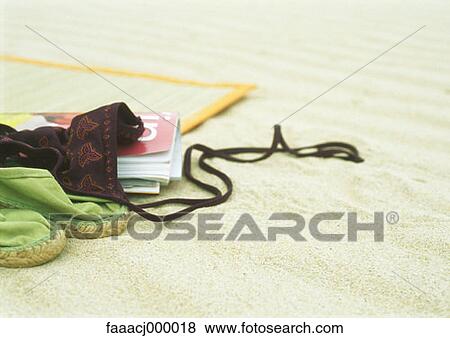 Stock Photo - beach, sand, beach mat, beach mats, espadrilles, summer, close-up. Fotosearch