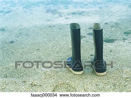 boots, boot, sea, beach, shore, shores, galoshes View Large Photo Image Picture - boots, boot, sea, beach, shore, shores, galoshes. Fotosearch