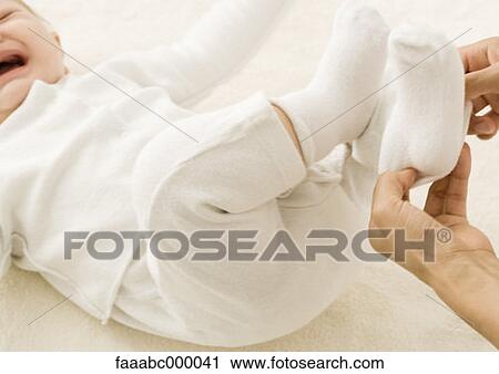 crying, sobbing, baby, toddler, infant, getting dressed, dressing View Large Photo Image Stock Image - crying, sobbing, baby, toddler, infant, getting dressed, dressing. Fotosearch