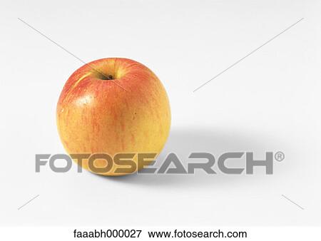 Stock Photo - fruit, apple, food and drink, gastronomy, close-up, close shot, orange. Fotosearch