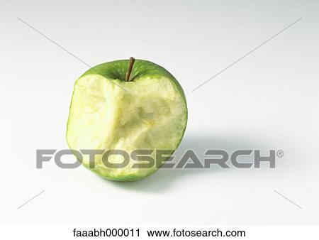 Stock Image - fruit, apple, granny smith, granny smith apple, biting into, food and drink, gastronomy. Fotosearch