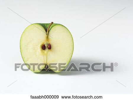 Stock Photo - fruit, apple, granny smith, granny smith apple, cross section, cut, food and drink. Fotosearch