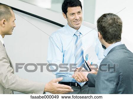 Stock Photo - greeting, greetings, handshake, shaking handshakes, male, males. Fotosearch