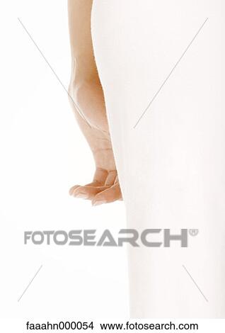 Picture - hand, leg, woman, females, feminine, part of, cropped. Fotosearch