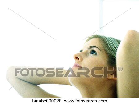 Stock Photo - looking, head, woman, females, pensive, looking up, hope. Fotosearch