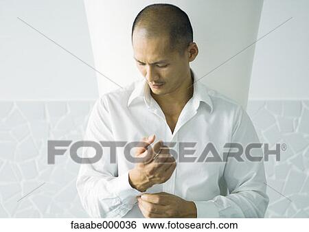 male, males, button down shirt, button down shirts, buttondown shirt, button-down shirt View Large Photo Image Stock Photograph - male, males, button down shirt, button down shirts, buttondown shirt, button-down shirt. Fotosearch