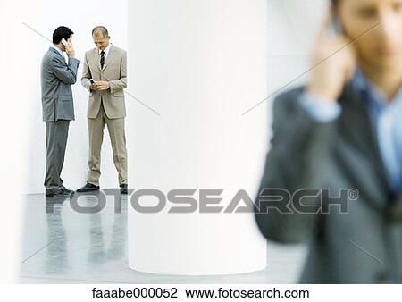 Stock Image - male, males, colleague, colleagues, co-worker, businessman. Fotosearch