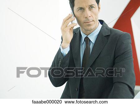 Stock Image - male, males, head of company, leader, business owner, boss. Fotosearch