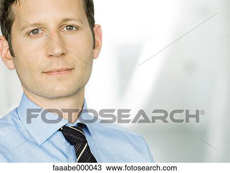 Stock Image - portrait, male, males, ambitious, serious, seriousness. Fotosearch