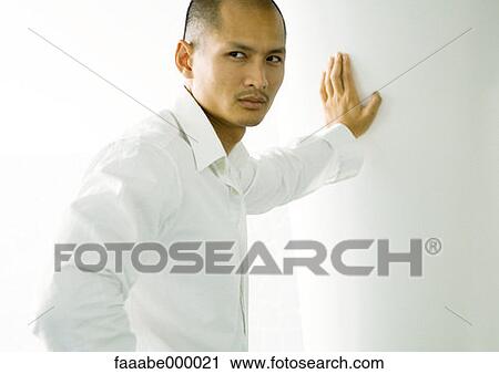 Stock Image - portrait, male, males, thinking, serious, seriousness. Fotosearch